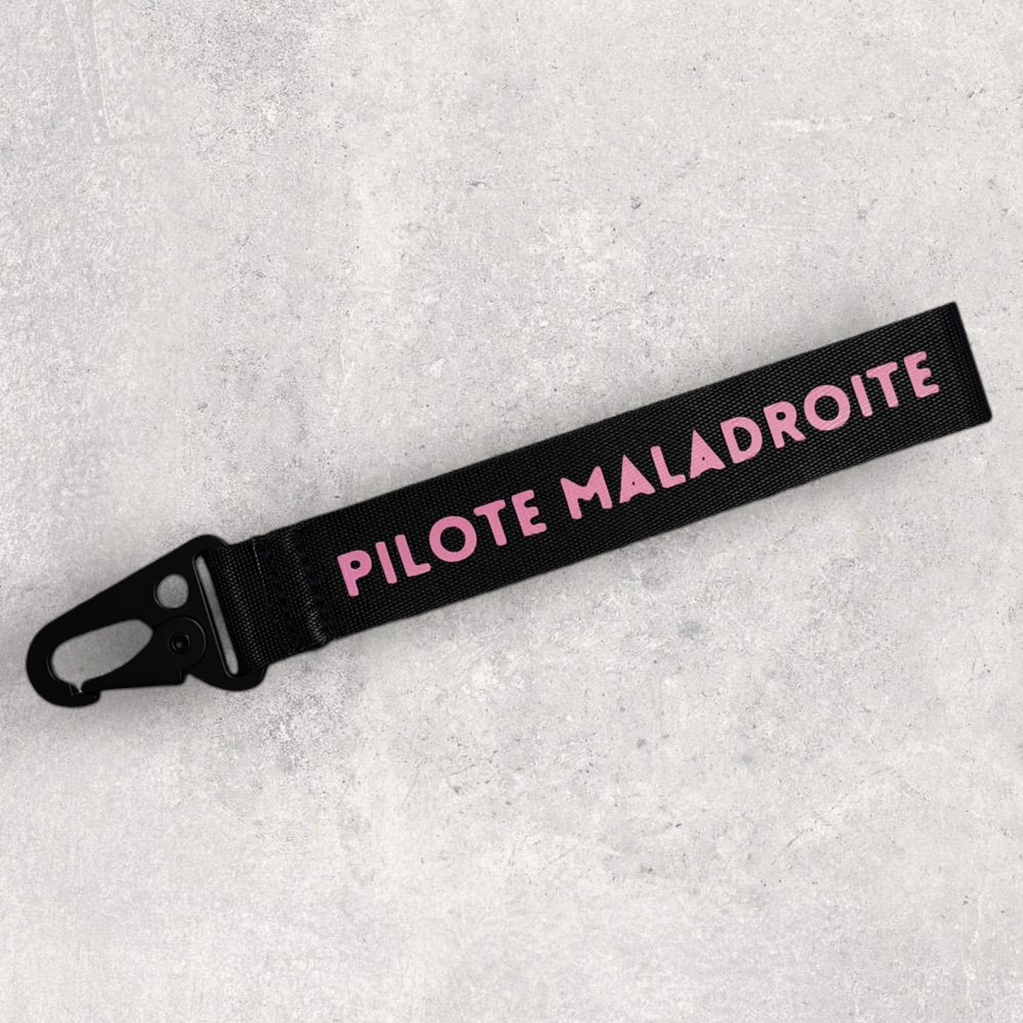 Porte-clés 2 faces " Pilote maladroite mais rapide ! "
