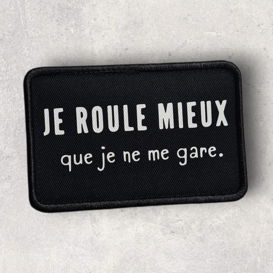 Patch amovible humour " Je roule mieux que je ne me gare. "